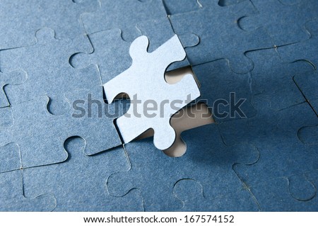 Last piece of jigsaw puzzle - blue tone