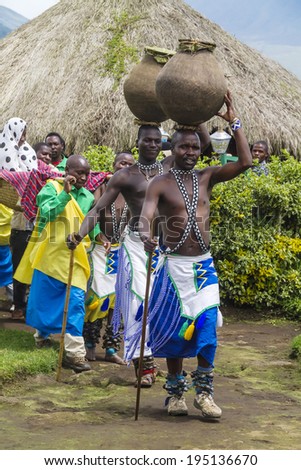 MUSANZE, RWANDA - NOVEMBER 5: Tribal ritual of the Batwa Tribe Perform Traditional Intore Dance to Celebrate the Birth of an Endangered Mountain Gorilla on November 5, 2013 in Musanze, Rwanda.