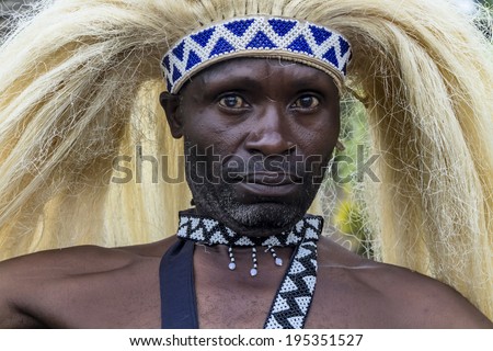 MUSANZE, RWANDA - NOVEMBER 5: Tribal Dancer of the Batwa Tribe Perform Traditional Intore Dance to Celebrate the Birth of an Endangered Mountain Gorilla on November 5, 2013 in Musanze, Rwanda.