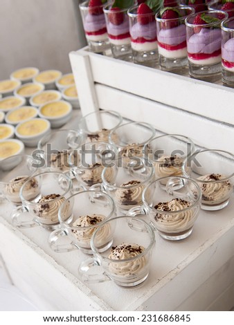 Selection of decorative desserts on a buffet table