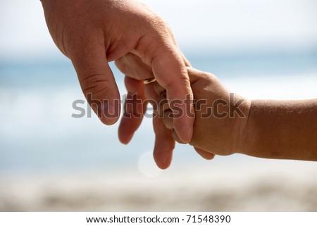 father and son holding hands. stock photo : Father and son