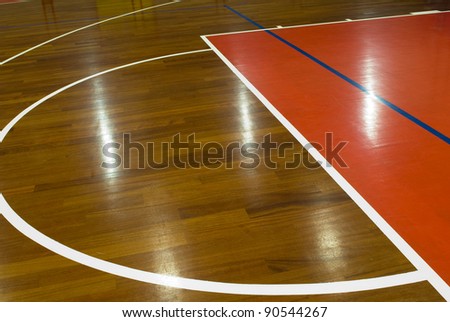 Wooden basketball court. Indoor sports playground