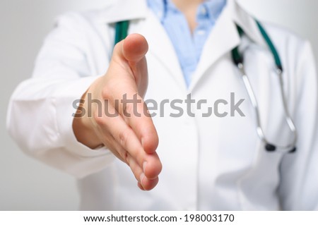 Close up of doctor giving her hand for handshake