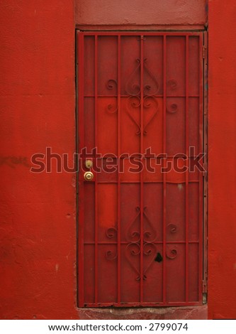red door with golden door knob