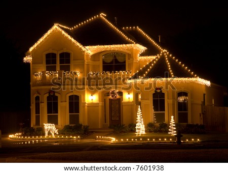 House Decorated and Lighted for Christmas at Night