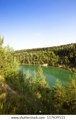 the flooded pits with green water. were formed after chalk production. Belarus,  krasnoselsk