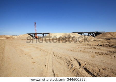 Construction of a new road at the initial stage. bridge construction