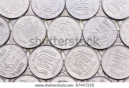 background of Ukrainian coins of five cents (coin silver color)