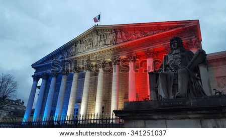 Paris, FRANCE. 11.19.2015. The French National Assembly lighted with the colors of the French flag to pay tribute to the victims of the terrorist attacks.