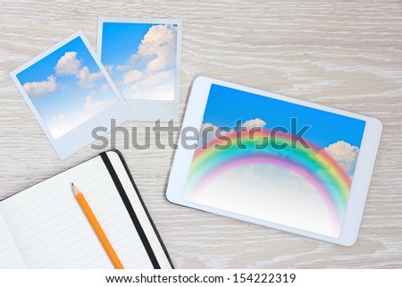 tablet computer vintage photo blue summer sky rainbow