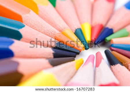 macro colorful crayons on white background