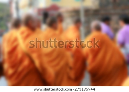 blurred image background, offer food to monk on early morning