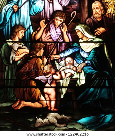 Details Of Christmas Stained Glass Window Depicting Birth Of Jesus, With Mary, Joseph And Shepherds
