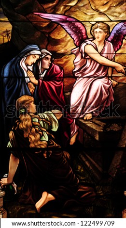 Easter Stained Glass Window Depicting Mary Magdalen And Women At The Empty Tomb Of Jesus On Day Of Resurrection