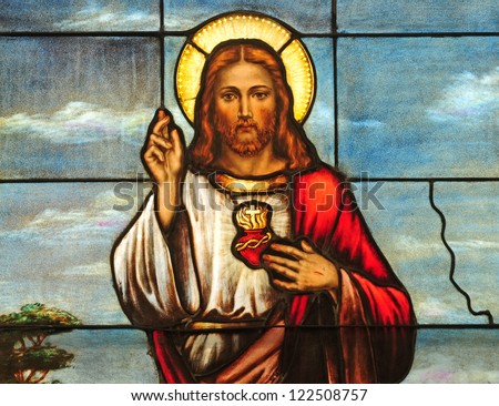 Stained glass window depicting Sacred Heart of Jesus