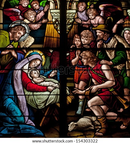 Stained glass window depicting biblical Christmas scene, the birth of Jesus Christ