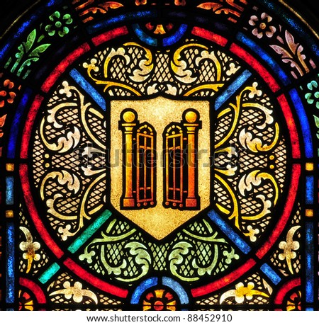 Stained glass window design detail with golden gates, heavenly  gates
