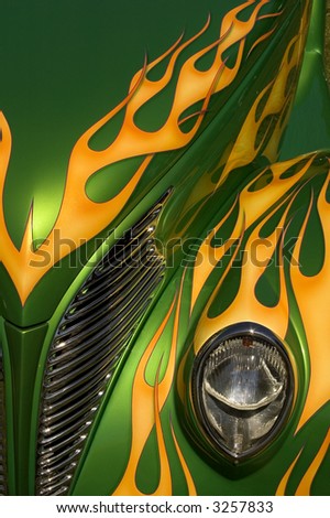 stock photo A green hot rod with yellow flames