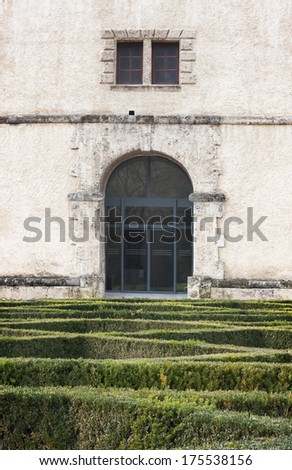 Door of a building with garden in Grenoble, France.