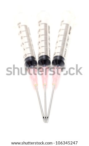 Plastic syringe with hypodermic needle isolated on white background