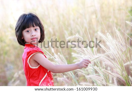 cute lovely sweet asian chinese kid girl with smiling face on the road ,Chinese girl play in the park,Portrait of little Asian girl