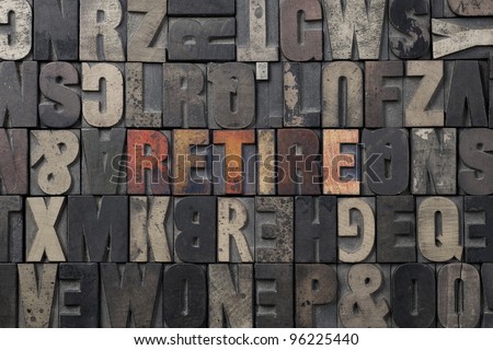 The word Retire written in antique letterpress printing blocks.