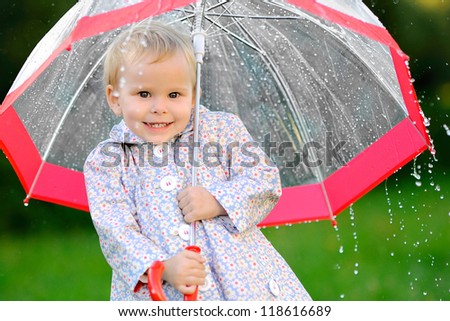 portrait of a little girl with umbrella