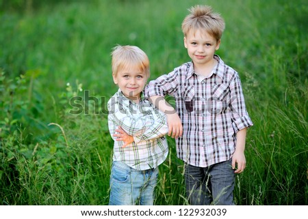 portrait of two brothers summer in the country