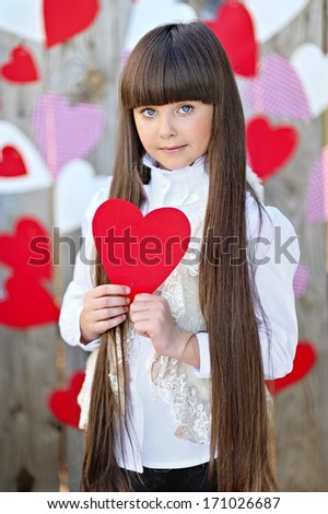 portrait of little girl with decor style Valentine\'s Day