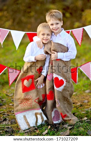 Portrait of two brother with decor style Valentine\'s Day