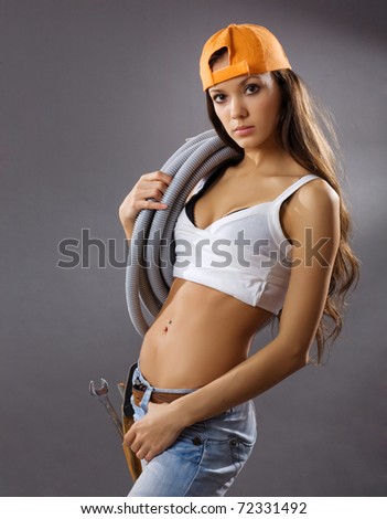 stock photo sexy young woman construction worker Save to a lightbox 