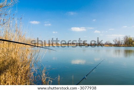 Fishing still life with blue cloudy sky