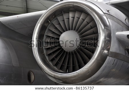 Huge Jet engine on an old plane