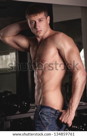 Sexy male fitness model. Fashion portrait