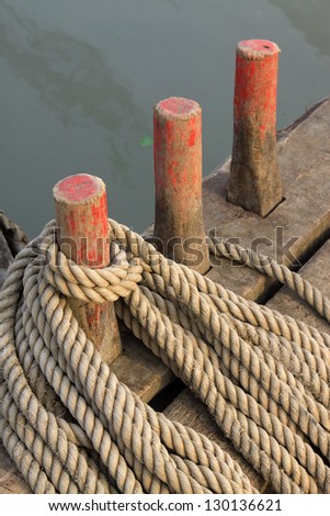 closeup of pictures, coir rope on the wooden boat