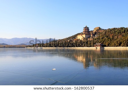 Beijing, December 10: Tower of Buddhist incense and frozen Kunming lake in the Summer Palace on December 10, 2011, Beijing, china.