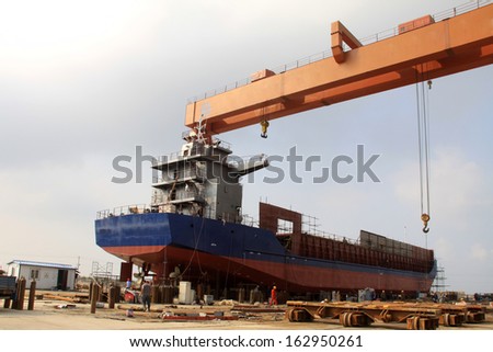 LUANNAN COUNTY - AUGUST 26: A cargo ship maintenance is in progress in a shipyard, On August 26, 2011, luannan county, hebei province, china.