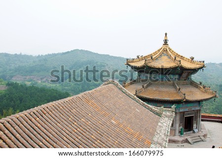 CHENGDE - AUGUST 14: The gold copper tile eaves of core architecture in the Putuo temple, august 14, 2011, chengde city, Hebei province, China.