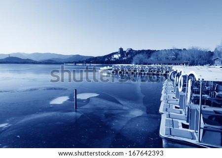 BEIJING - DECEMBER 10: The boats in the Kunming lake in winter in the Summer Palace on December 10, 2011, Beijing, china