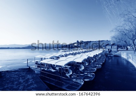 BEIJING - DECEMBER 10: The boats in the Kunming lake in winter in the Summer Palace on December 10, 2011, Beijing, china
