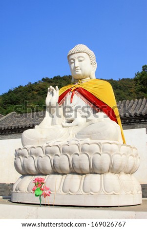 LUAN COUNTY - OCTOBER 3: The White marble bodhisattva sculpture in the YanGu temple architectural appearance in the QingLong mountain, on october 3, 2012, luan county, hebei province, china