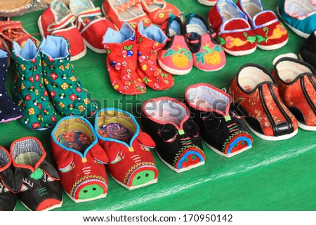 Chinese traditional handmade shoes, closeup of photo