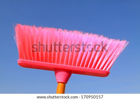 daily necessities -- color plastic broom, closeup of photo