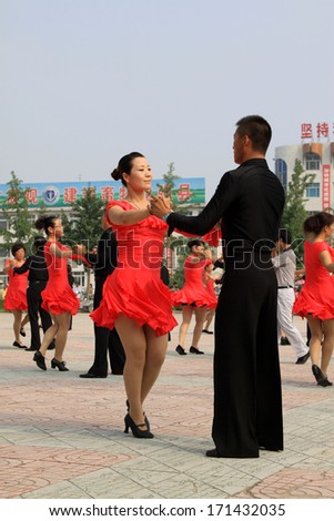 Luannan County, August 8: Sports Dance -- collective three step color on August 8, 2012, Luannan County, Hebei Province, china.
