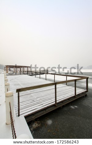 rails and platforms in ice and snow, in a park, China
