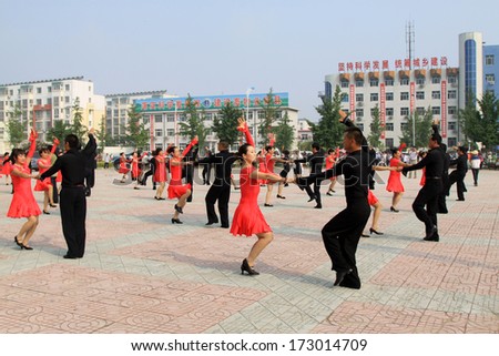 Luannan County, August 8: Sports Dance -- collective three step color on August 8, 2012, Luannan County, Hebei Province, china.