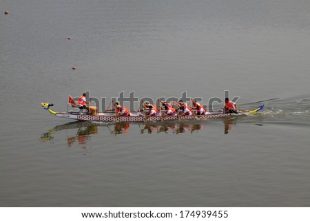 LUANNAN - JUNE 13: The dragon boat race scene in Chinese traditional Dragon Boat Festival on June 13, 2013, Luannan, Hebei Province, China.