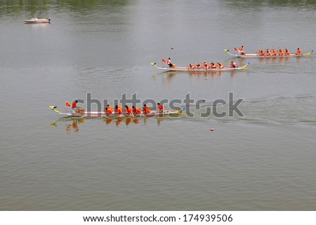LUANNAN - JUNE 12: The dragon boat race scene in Chinese traditional Dragon Boat Festival on June 12, 2013, Luannan, Hebei Province, China.