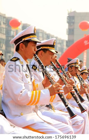 TANGSHAN -  SEPTEMBER 16: The military band playing in the 15th session of tangshan China ceramics exposition on september 16, 2012, tangshan, china.