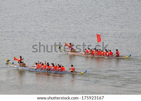 Luannan - June 14: The Dragon Boat Race Scene In Chinese Traditional Dragon Boat Festival On June 14, 2013, Luannan, Hebei Province, China.
